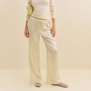 Reformation Olina Cream Satin Trousers in color sugar